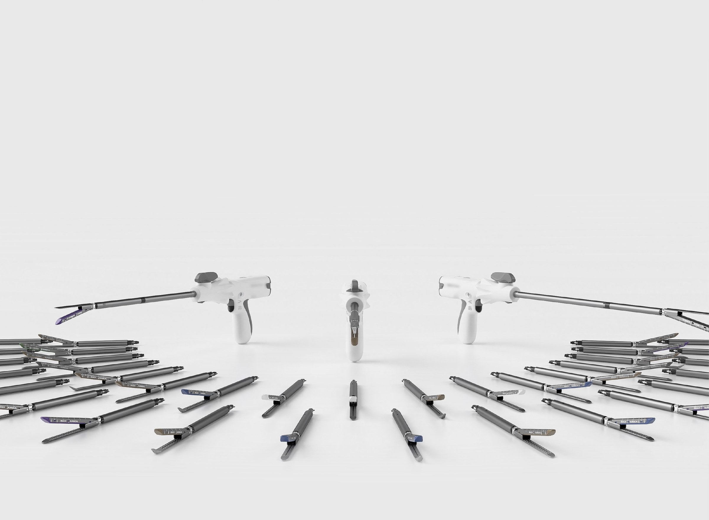 The iReach Omnia platform: two powered handles, a battery and the full range of reload cartridges arranged on a studio surface.