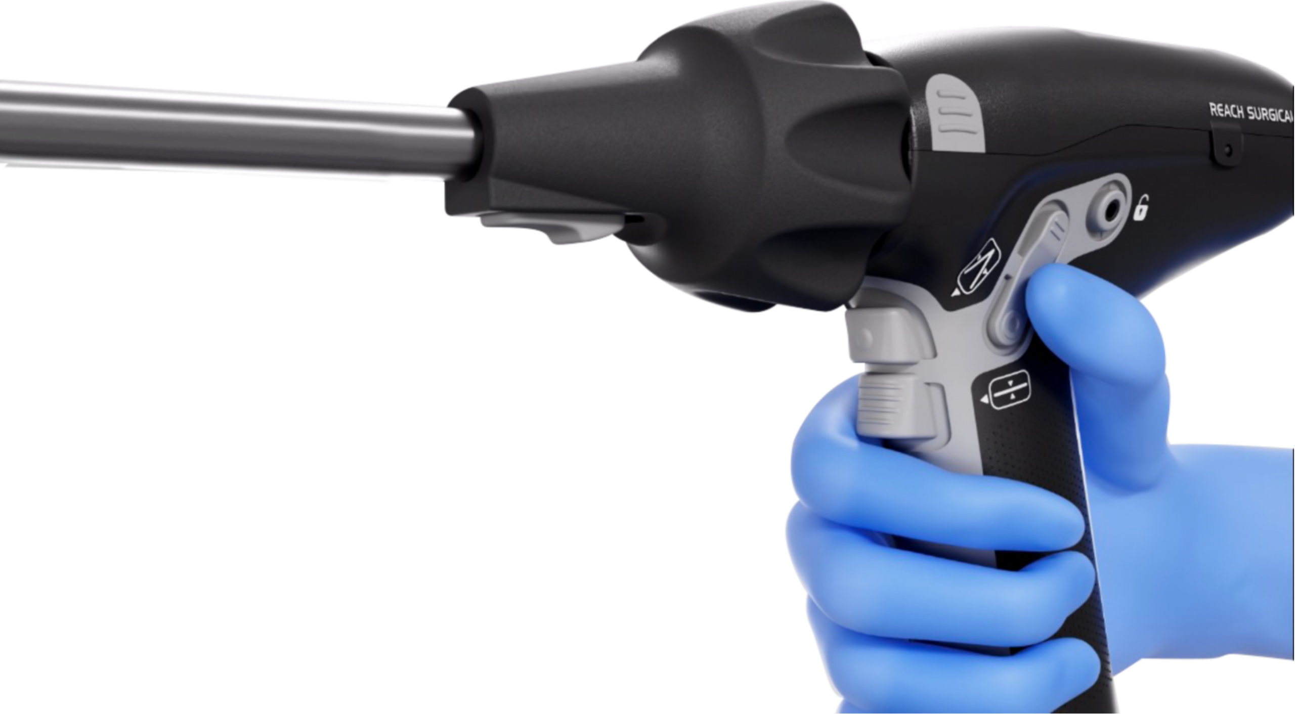 A gloved hand on the IRIS handle, thumb on the articulation controls.